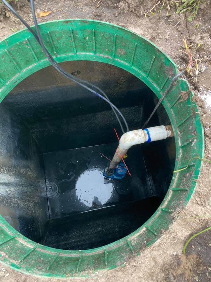 Victor Plumbing installed a septic pipe in a hole in the ground.