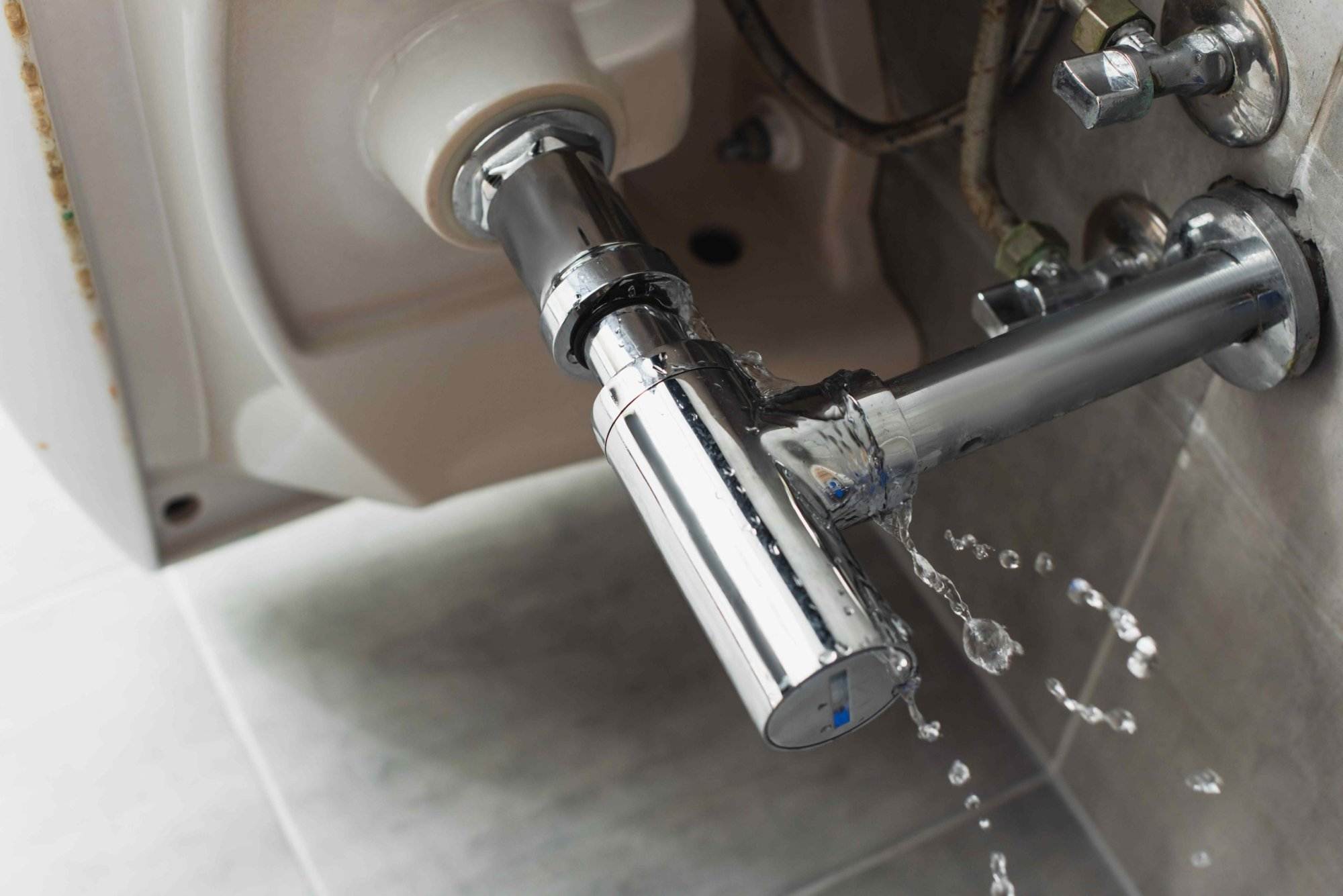 A toilet with water coming out of it, in need of Victor Plumbing's expertise for septic repair.